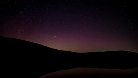 A time-lapse of the northern light over Ullswater in the English Lake Distric Stock Footage 305338719