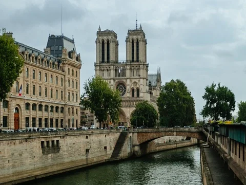Time lapse of Notre-Dame de Paris on a summer day with clouds Stock Footage 79835061