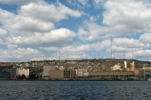 Time lapse NTSC clouds passing over downtown Duluth  動画素材 524639