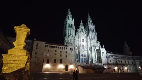 Time lapse in Obradoiro square at night with the cathedral of Santiago illumi Stock Footage 170203176