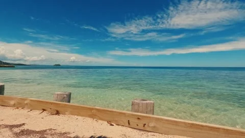 Time Lapse Ocean View from Sea Wall with Boat and Moving Clouds Stock Footage 319683400