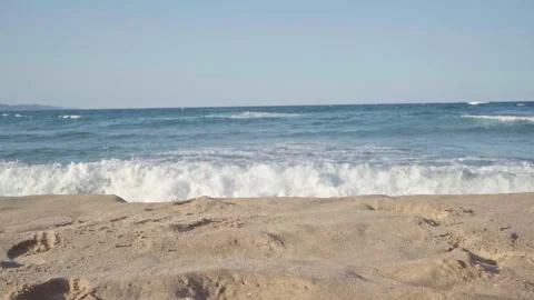 Time lapse of ocean waves crashing onto the beach Stock Footage 254797796