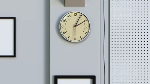 Time lapse of an office clock measuring off one hour Video stock 79555945