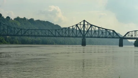Time lapse of the Ohio River and a train bridge in Beaver County, Pennsylvania Stock Footage 71145405