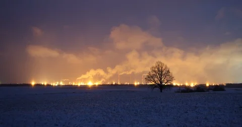 Time Lapse Oil Processing at Oil Refinery Plant -  Silhouetted Tree Stock Footage 106684864