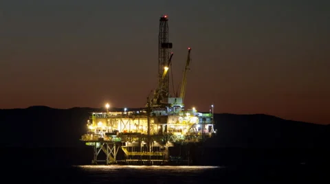 Time lapse of an oil rig at dusk at Huntington Beach, California Stock Footage 57329484