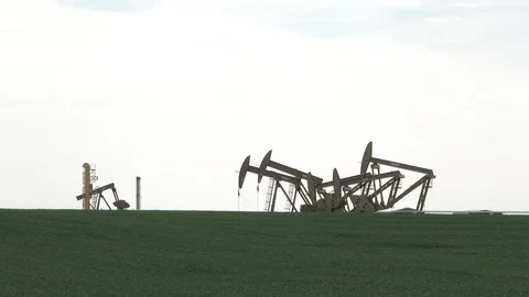 Time Lapse Oil Rigs Pumping From Rural Wells Stock Footage 112953400