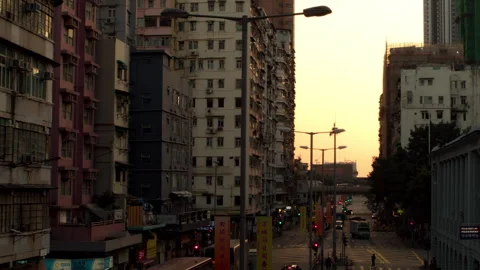 Time lapse, old district of Hong Kong urban, sun setting on main road Stock Footage 254870470