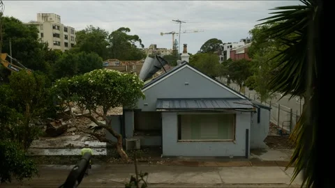 Time lapse a old Sydney house torn down in Australia 4K Stock Footage 325015573