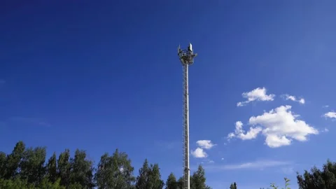 Time lapse of older Cell tower antennas transmitting data, repeaters for mobile Stock Footage 160756923