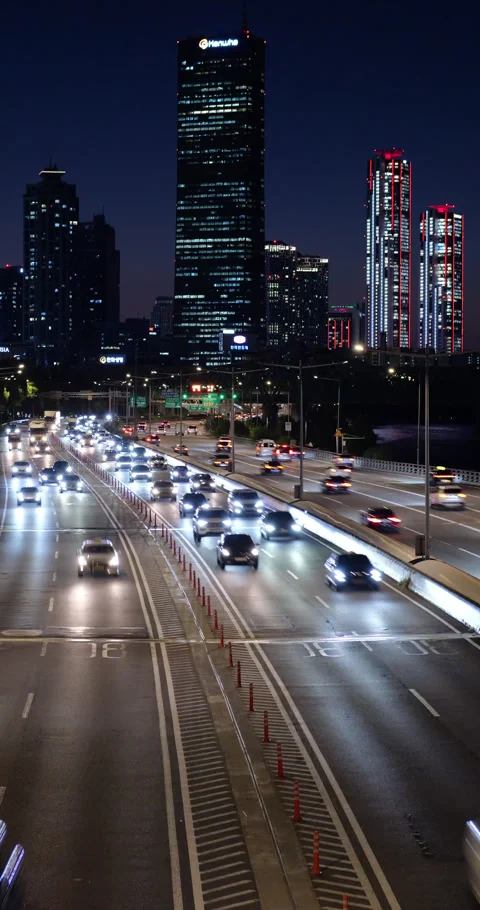 Time-lapse of Olympic-daero at night, 63 Building in background Stock Footage 295083077