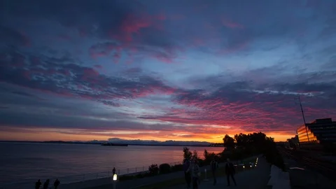 Time-Lapse of the Olympic Mountains with Clouds at Sunset_Seattle, WA 4K Stock Footage 100567255