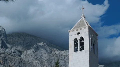 Time Lapse - Ominous Cloud Gathering Above A Church Tower Stock Footage 98016137