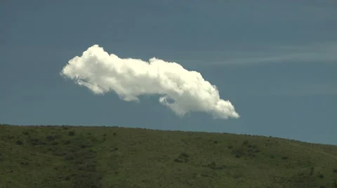 Time Lapse of One Lonely Cumulus above Hillside Stock Footage 54729024