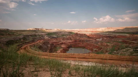 Time lapse. Operating mine. Blue sky. Moving clouds. Excavator. Truck. Green Stock Footage 64510813