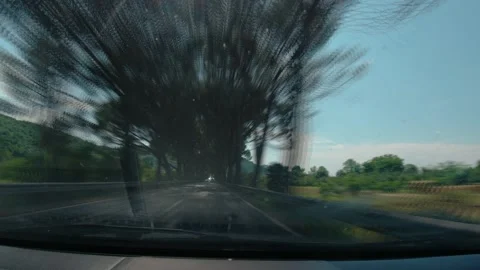 Time lapse or hyper lapse of dashcam dashboard camera view of car driving Stock Footage 156077548