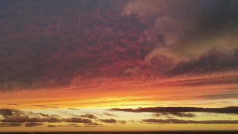 Time lapse of orange and red clouds at sunset in 4K Stock Footage 152458732