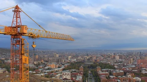 Time-lapse: Orange crane on a background moving clouds Stock Footage 76650841