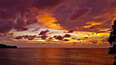 Time lapse of orange sunset  in tropical bay Video stock 33227776