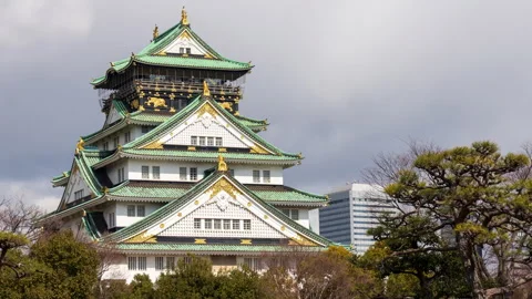 Time-lapse of Osaka Castle with drifting clouds in the daytime sky Stock Footage 310951011