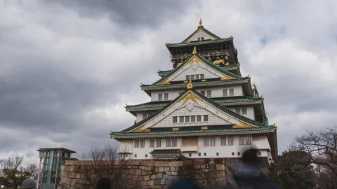 Time-lapse of Osaka Castle with drifting clouds in the daytime sky Stock Footage 310951012