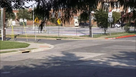 Time lapse outside school parking lot 64x Video stock 76545151