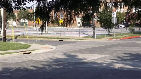 Time lapse outside school parking lot 16x Video stock 76545403