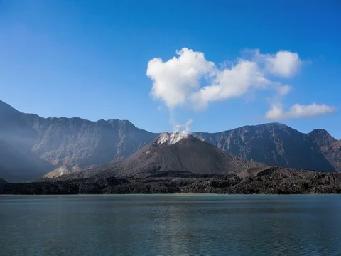 Time lapse over Barujari mount from Segara Anak lake Stock Footage 74538034