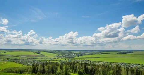 Time lapse over a beautiful flat landscape shot at different times of the year Stock Footage 129400854