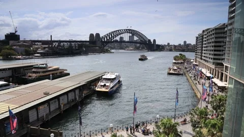 Time lapse over Circular Quay of Sydney Harbour waterfront ferries as 4k. Stock Footage 219532371