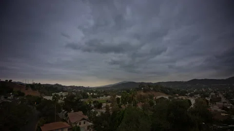 Time-lapse over Eagle Rock of cloudy day above mountain valley Stock Footage 219373895