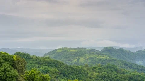 Time lapse over green hill in the morning Stock Footage 230136281