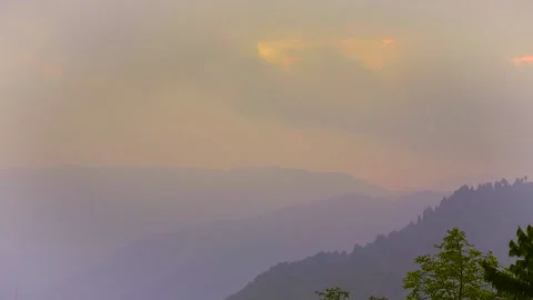Time lapse over himalayan mountain, As the sun rises, clouds float across the Stock Footage 149783011