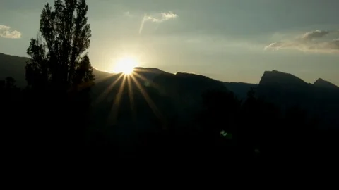 Time lapse over the mountains at sunset Stock Footage 75306483