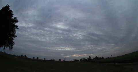 Time lapse of overcast sky from day to night Stock Footage 63306900