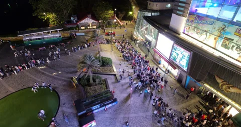 Time-lapse overhead view of long moving queue to Peak Tram, late evening Stock Footage 309402236