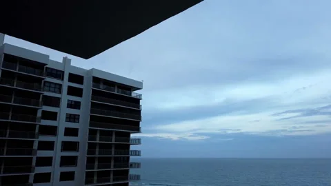 Time lapse at Palm Beach shores Florida tilting down at dusk over ocean Stock Footage 214155002