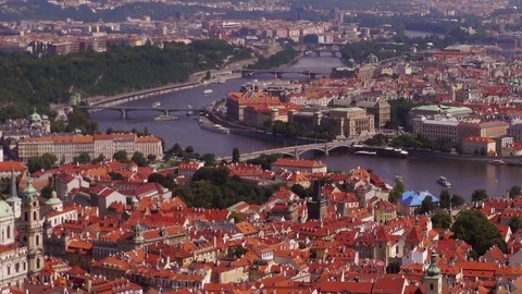 Time-lapse pan along the Vltava River in Prague – passing the Charles Bridge Stock Footage 82761341