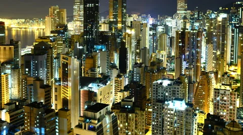 Time Lapse Pan of Hong Kong Skyline and Victoria Harbor at Night - Hong Kong Stock Footage 47417849