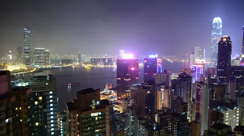 Time Lapse Pan of Hong Kong Skyline at Night - Hong Kong China Stock Footage 47463367