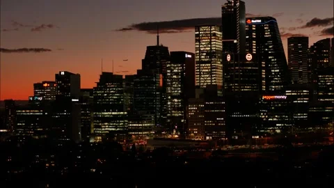 Time lapse pan Sunset Sydney skyscrapers and traffic 4K Video stock 247360716