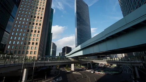 Time-lapse pan-up view of Shiodome business district and Yurikamome line, Tokyo, Видео 43357096