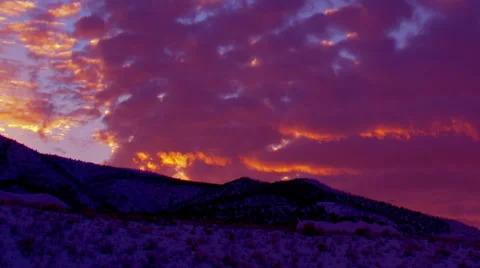 Time-lapse panning shot of mountain and clouds in Utah at sunset Stock Footage 52328247