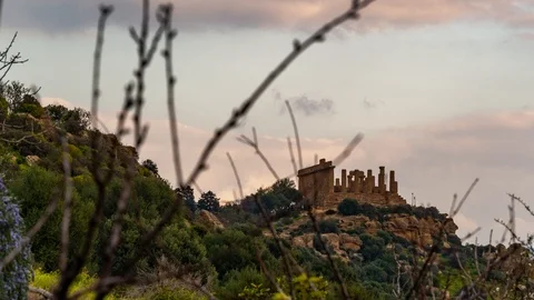 Time lapse panning view of greek temple of Juno in Sicily at sunset Stock Footage 103618439