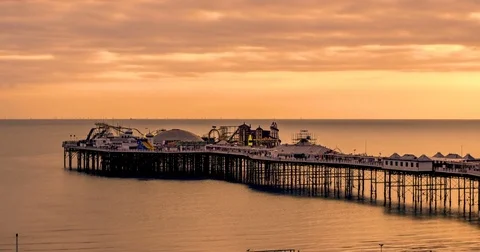 Time lapse panning view of a sunset on the beach in Brighton Stock Footage 71159661