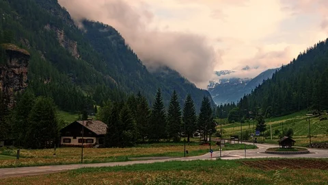 Time lapse panning view of a sunset in the Italian Alps in Aosta valley Stock Footage 115712993