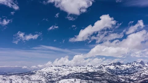 Time Lapse - Panoramic view of snow-capped mountain with clouds Stock Footage 258176668