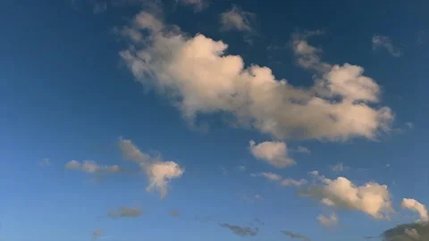 Time Lapse of Panoramic view of Soft Gray and Pink Clouds in Blue Evening Sky Stock-Footage 345987770
