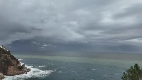 Time lapse of panoramic view of  stormy clouds, sea and the mediterranean bay Stock Footage 270737303