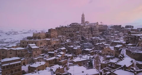 Time-lapse of panoramic view of typical stones Sassi di Matera and church Video stock 105864763